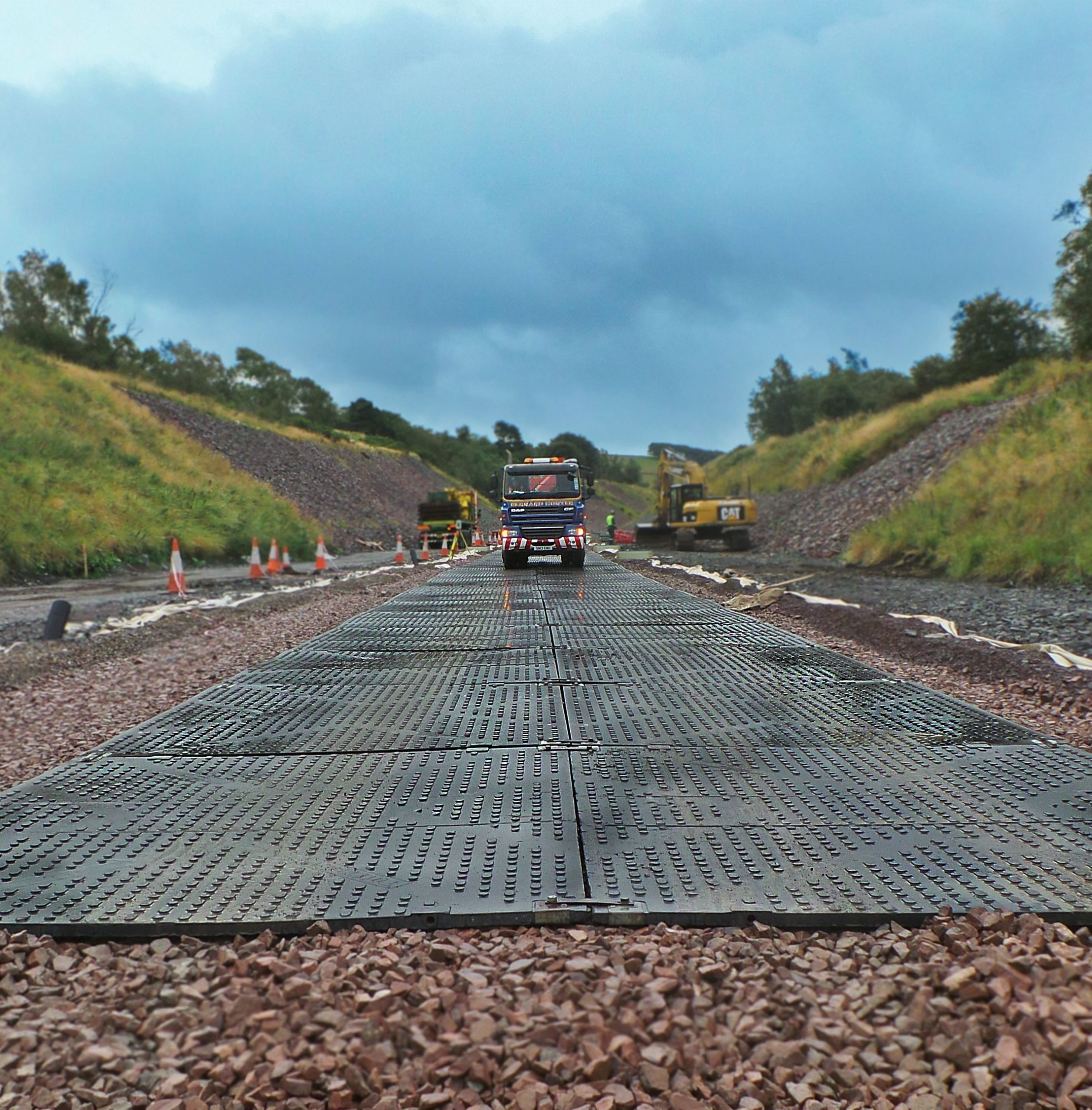 TuffTrak ground protection mat on site with truck driving over