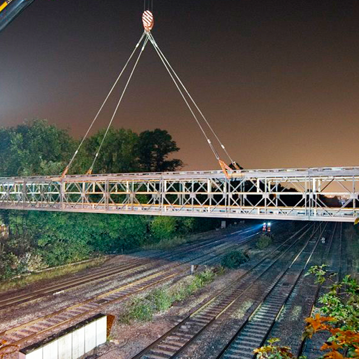Mabey Hire MU bridge being lifted over railway line