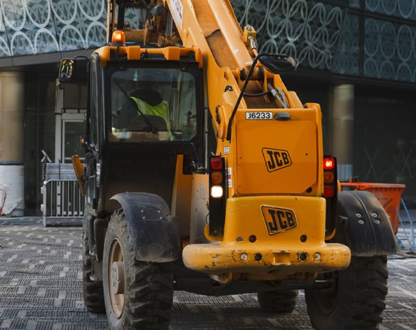 Mabey Hire access matting under JCB